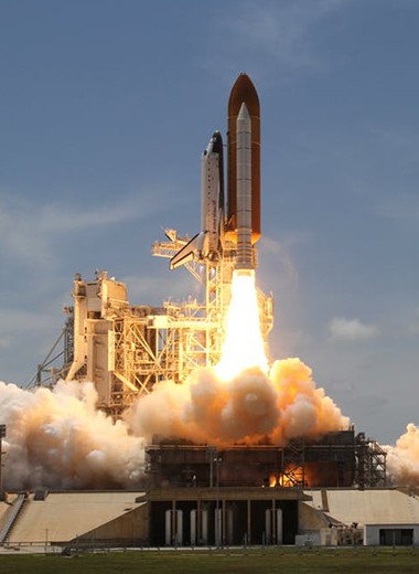 A space ship igniting the engines during lift off.